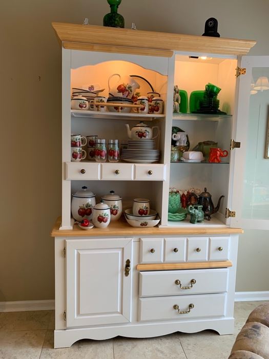 Kitchen hutch with lots of storage.