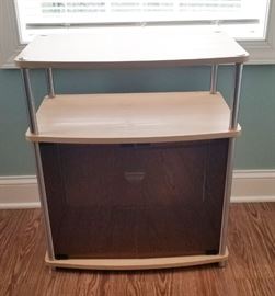 TV stand, measures 27" x 24" x 16"