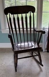 Dark wood rocking chair, beautiful!