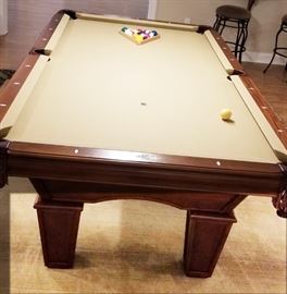Very well cared for Brunswick Glen Oaks 8 foot, slate, pool table. Four pool cues and various accessories. Brunswick Ping pong table top also available.