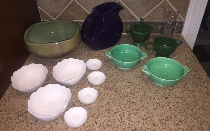 Handmade pottery decorative bowl, Martha Steward flower nesting bowls, purple Fiesta-ware pitcher, deep green Fiesta-ware creamer and sugar set, light green Fiesta-ware soup bowls