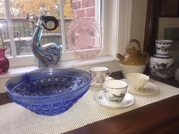 Wonderful gift items including mid century Murano art glass gold fleck amber horn ram, electric blue cut glass bowl, pink depression glass plate, gorgeous teacups and vintage pitcher