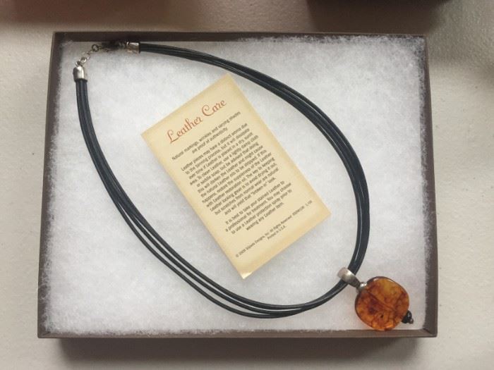 Stunning amber pendent on leather cord