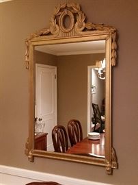 Ornate gilded mirror with a Grecian design 
