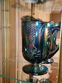 Vintage blue iridescent Carnival Glass pitcher.
