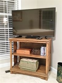 Toshiba 43 inch TV on oak stand/shelf
