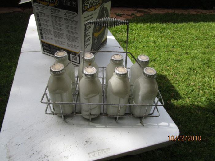 Milk bottles used for photo shoot.  Caps were made by photographer for the pic.