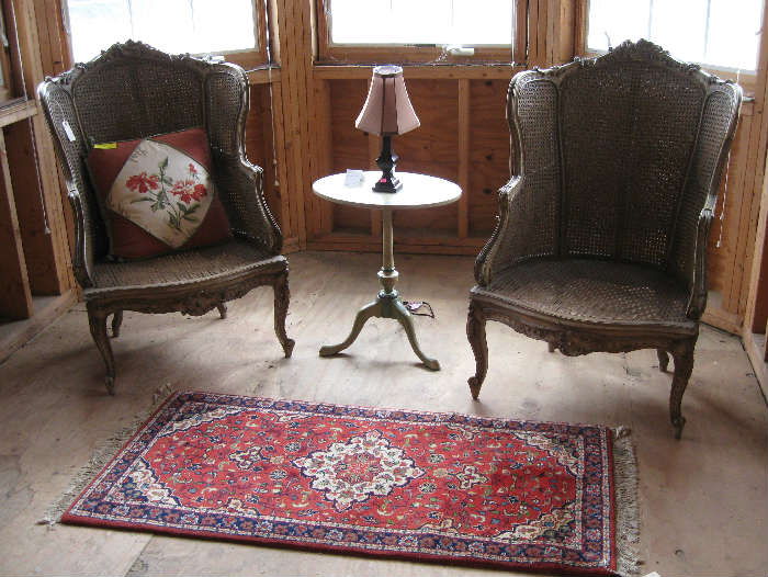 Pair of French Cane Armchairs, small oriental accent rung, painted side table, small lamp