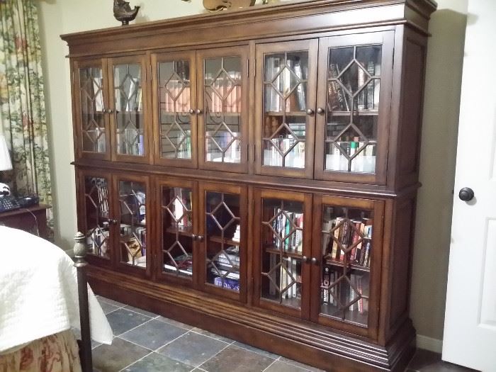 Beautiful lighted display case or bookcase (it is 2 pieces & can be taken apart for moving) and hundreds of books