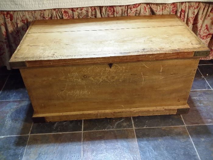 Antique pine immigrants trunk with original yellow paint