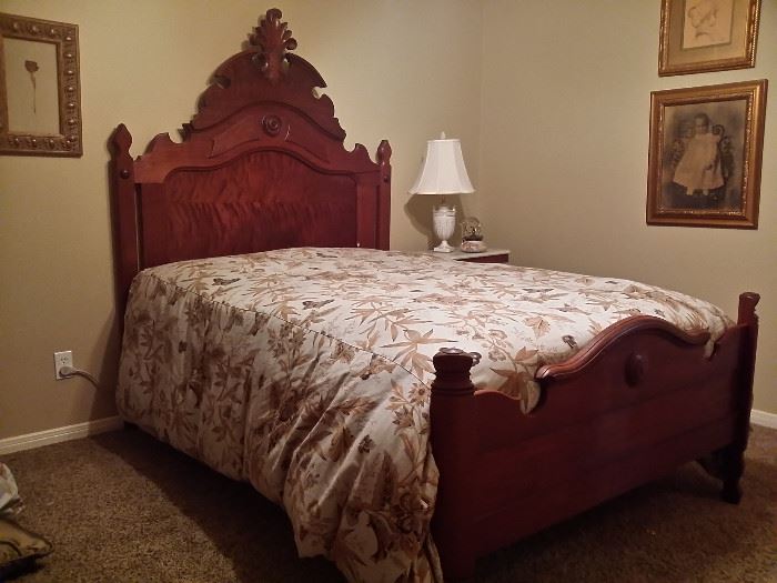 Antique bed with ornate walnut headboard & footboard, mattress & box spring