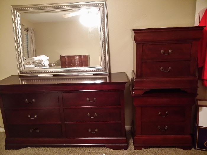 Mirror with silver frame, double dresser, two bedside tables