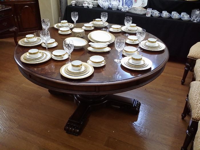 Pedestal dining table with leaves, 5 ft. in diameter, with circular leaves extends to 7 ft. in diameter