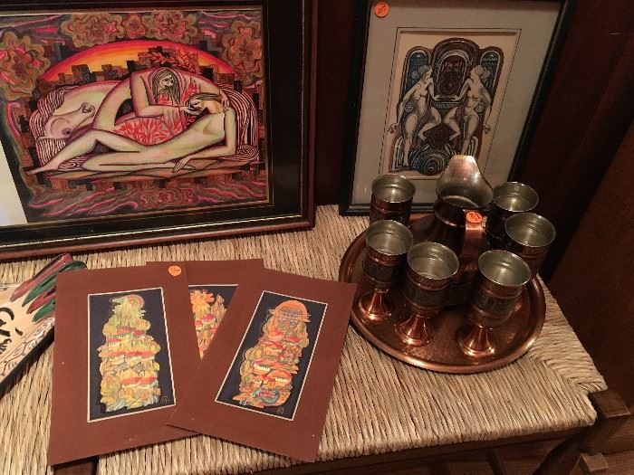 Artwork and copper tray with pitcher and glasses