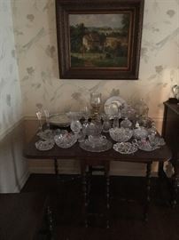 Drop leaf table with misc. crystal serving pieces