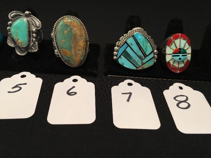 An assortment of Native American artist rings - Gilbert Tom and Amy Quandelacy are 2 of the artists featured