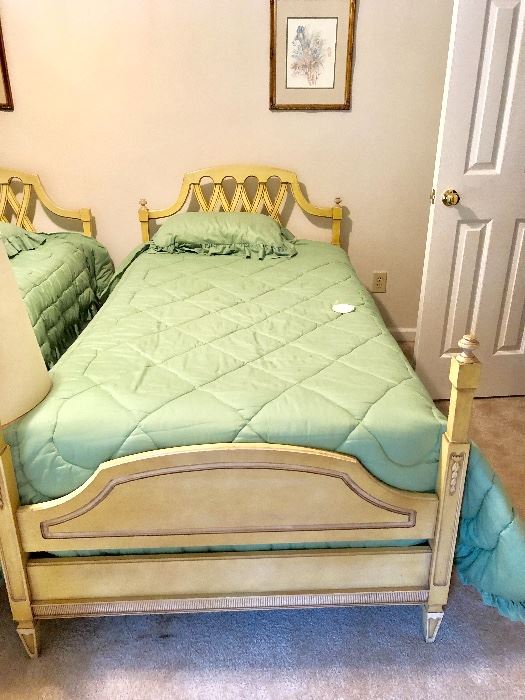 One of two twin size beds