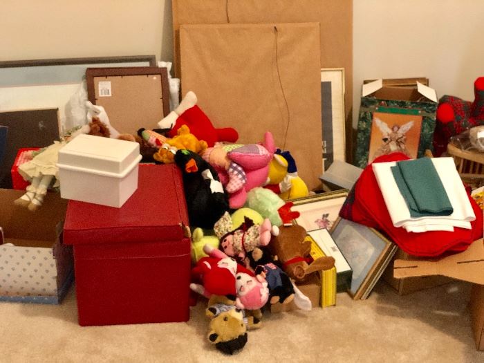 Stuffed animals, dolls, still sorting through