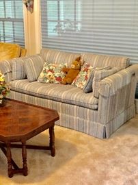 Several sofas and coffee tables