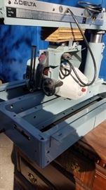 NEVER USED. WE TOOK OUT OF BOX.  10" DELTA RADIAL ARM SAW 