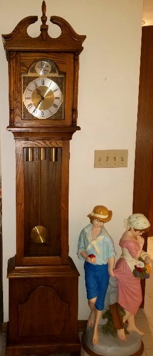 Grandmother clock & boy & girl cast figurine