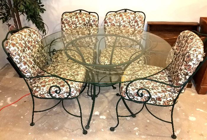 Glass top table & four chairs