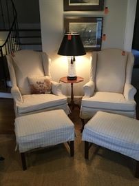 Slipcovered linen wing back chairs. Priced individually.