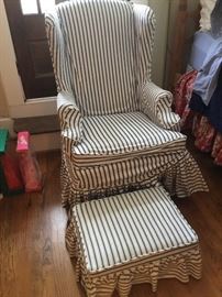 Slip-covered wing back chair with stool