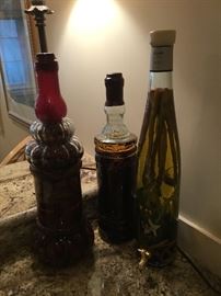 Tall decorative olive oil bottles