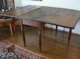 Drop Leaf Table 5' 3" long x 44" wide. Closed 21"