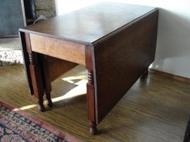 Drop Leaf Table 64-1/2" long x 44-1/2" wide. Closed 24"