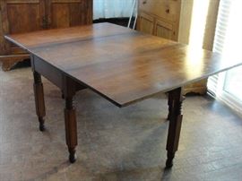 Drop Leaf Table 64-1/2" long x 44-1/2" wide. Closed 24"