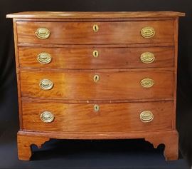 Cherry bow front chest