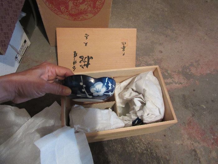 Japanese boxed set of small ceramic bowls.