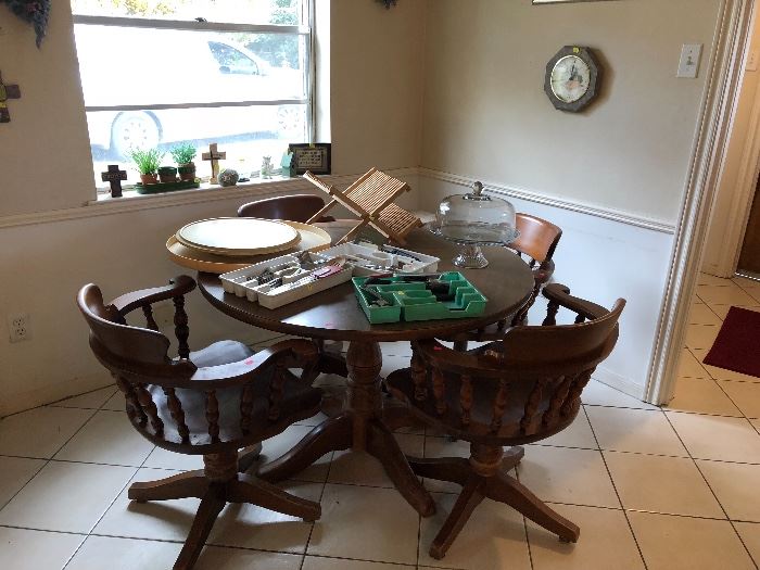 Solid wood table and 4 swivels chairs, cutlery sets