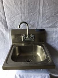 Stainless Steel Sink by L&J NY With a Tall Faucet