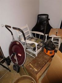 ab  exercise   ,white  chair,there   are   two  mid century  style  black  chairs