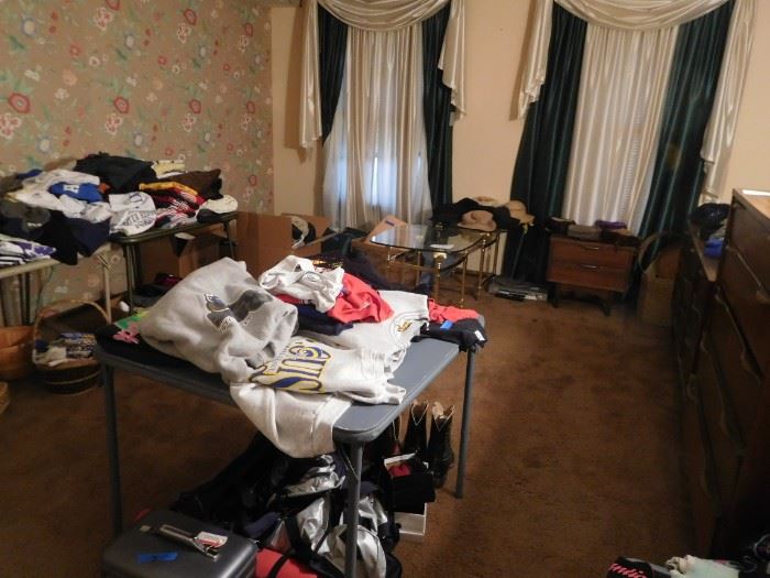 view  of  room  with  clothes,hats,furniture,shoes
