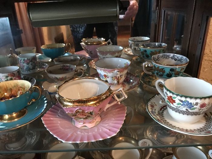 Various pretty cups and saucers