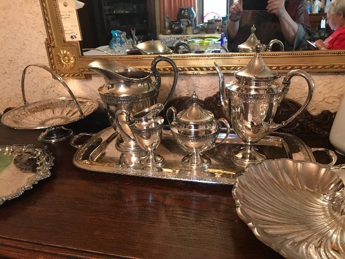 A few special silver-plate pieces of hollowware and flatware.