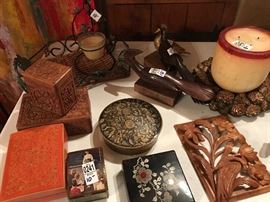 A collection of music boxes and other boxes.