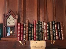 Vintage mantel clock with Eaton Press leather classics.