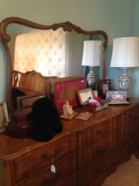 A triple dresser and large mirror