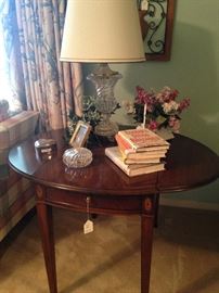 This good-looking drop-leaf side table has a companion.