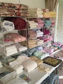 Many towel, blankets, and sheets