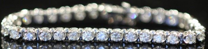 LOT #7044 - LADY'S DIAMOND 14KT WHITE GOLD TENNIS BRACELET