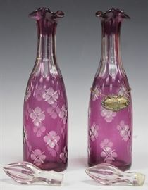 LOT #7499 - PAIR OF AMETHYST CUT TO CLEAR BOTTLES, 19TH C.
