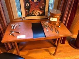 Fabulous mid=-century serving cart on wheels - expands to have a formica top area for serving