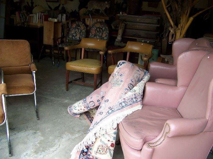 We have over twenty chairs. Oriental rug.