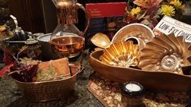 Interesting array of copper kitchenware + pots